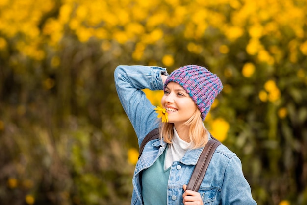 Young woman in a romantic autumn scenery.