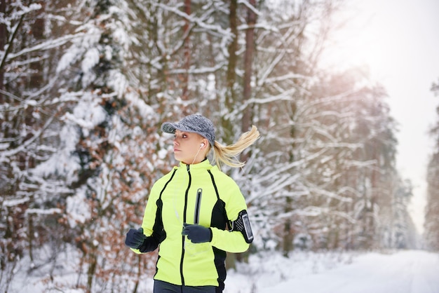 Young woman running on fresh air