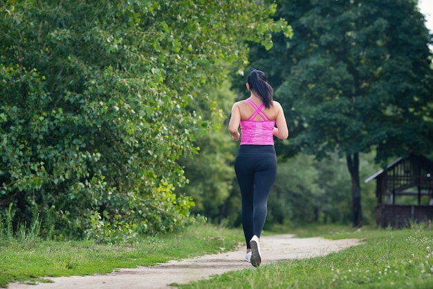 Young woman running in a park