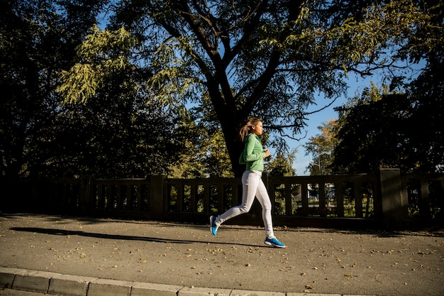 Young woman running in the park