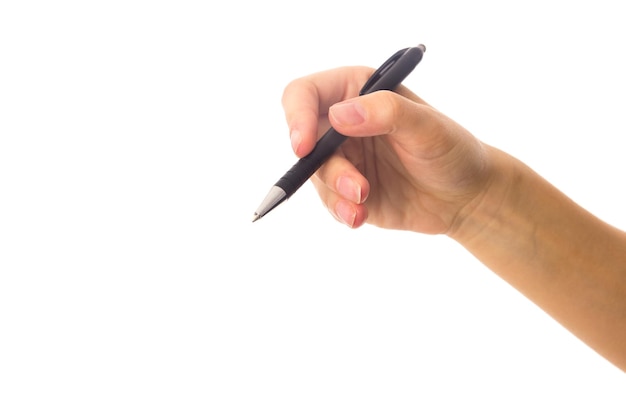 Young woman's hand using a black pen on white background in studio