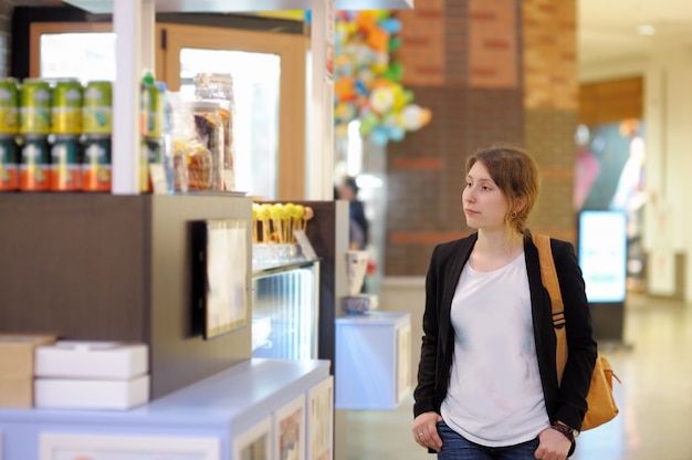 Young woman in shopping mall/center