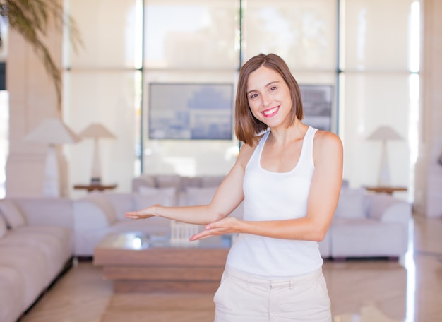 young woman showing sign in a resort