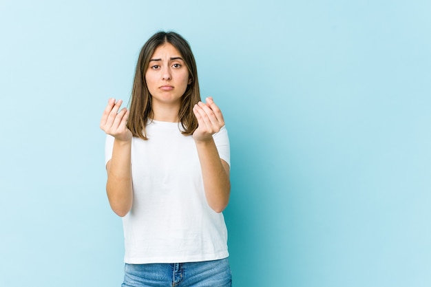 Young woman showing that she has no money