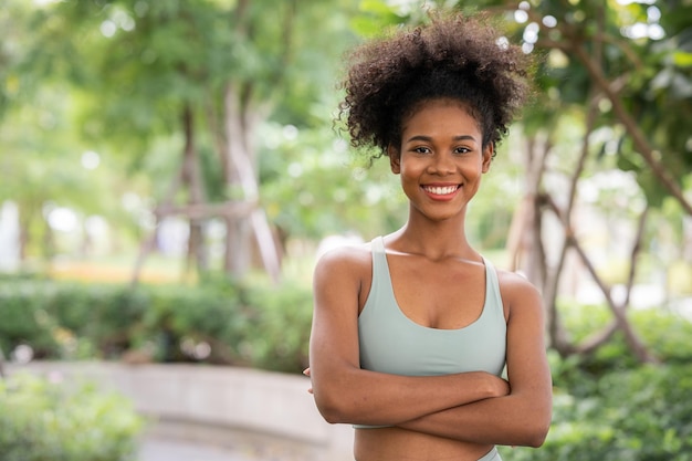 Young woman standing outdoor in the park