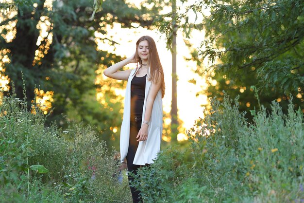 Young woman standing at park