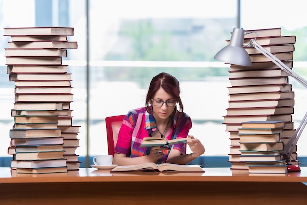 Young woman student preparing for college exams