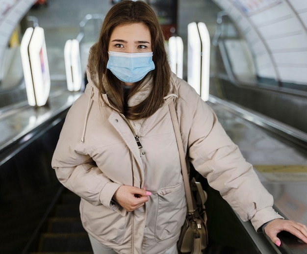 Young woman in a subway station