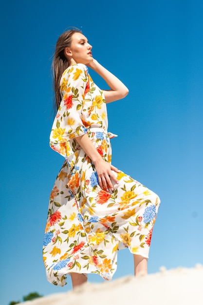 Young woman on the sunny beach