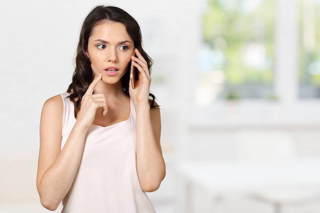 Young Woman Talking on Mobile Phone