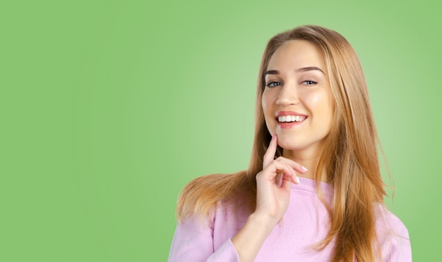 Young woman in a thoughtful pose