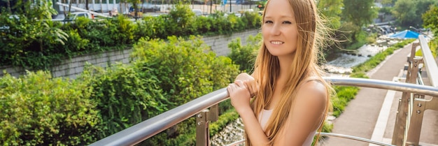 Young woman tourist in cheonggyecheon stream in seoul korea cheonggyecheon stream is the result of a