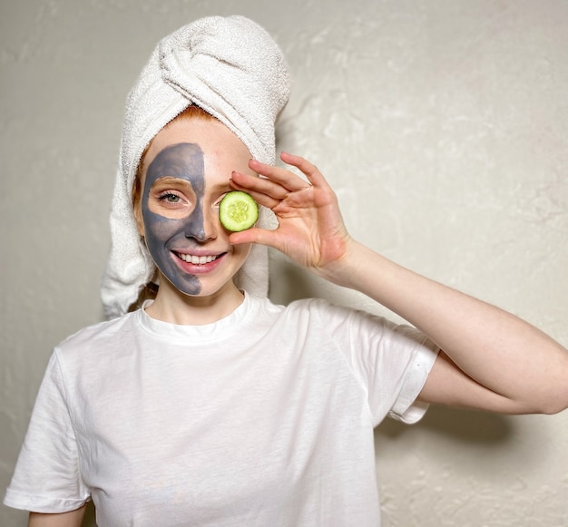 Young woman in a towel on her head