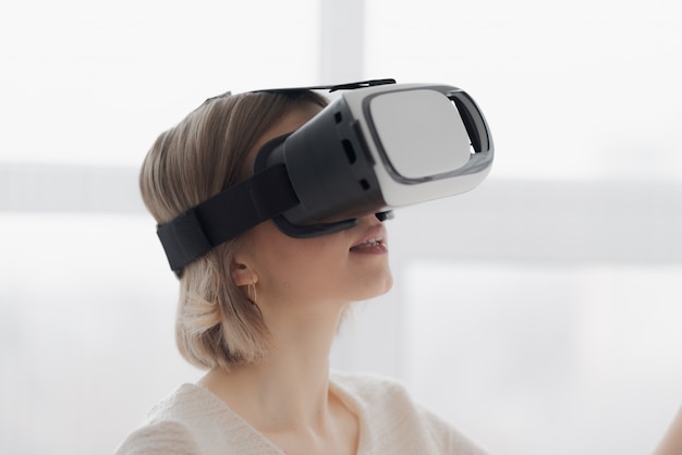 Young woman in virtual reality glasses - close-up