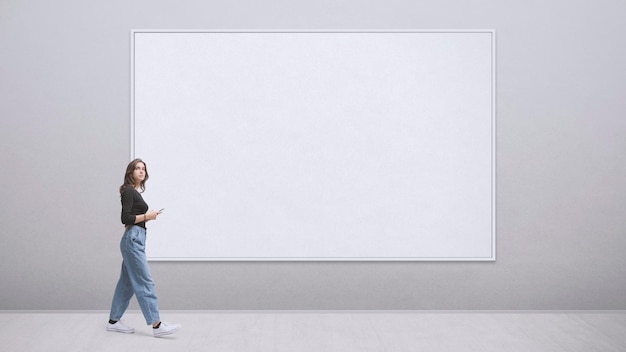 Young woman walking in the art gallery she is looking at the paintings blank copy space