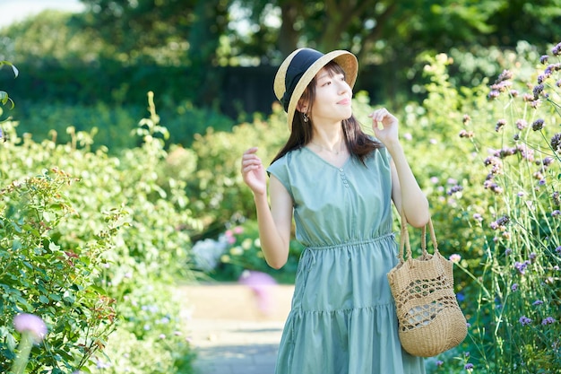 Young woman walking in green