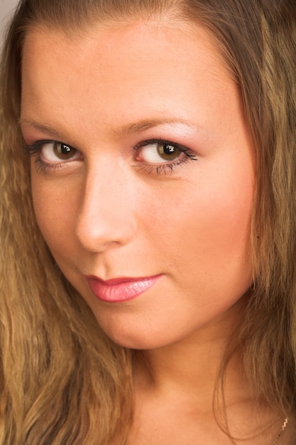 Young woman over white background