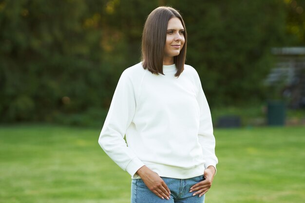 Young woman in white blouse. High quality photo