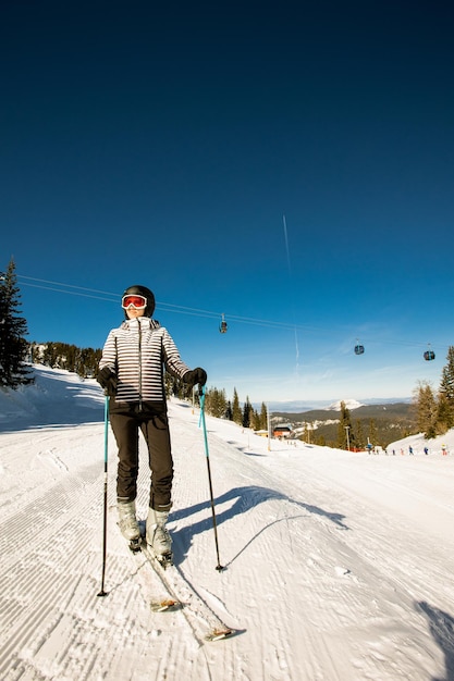 Young woman at winter skiing bliss a sunny day adventure