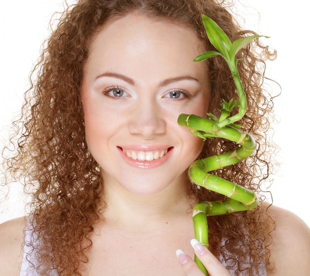 Young woman with bamboo.