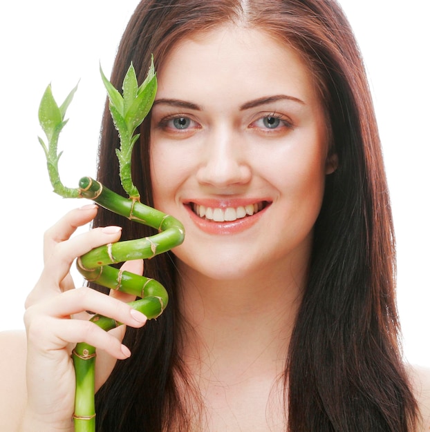 Young woman with bamboo