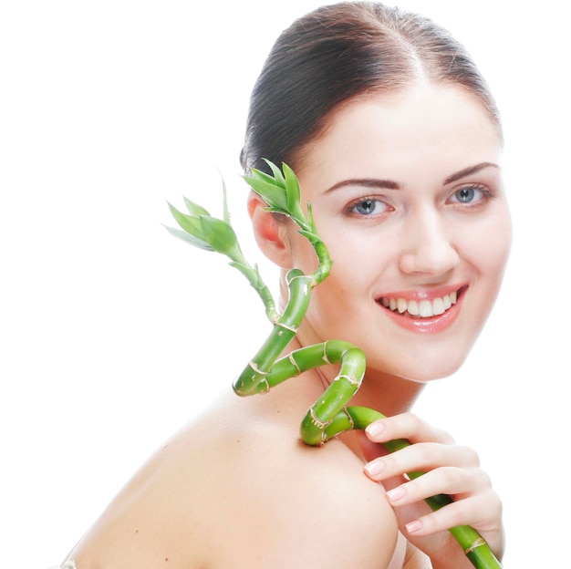 Young woman with bamboo