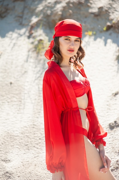 Young woman with beach pareo during tropical vacation Beautiful girl enjoy her summer holidays