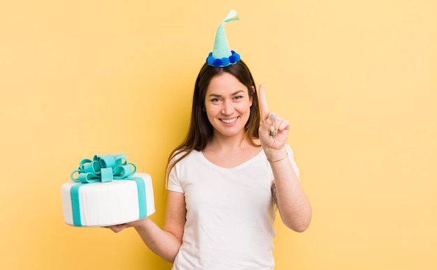 Young woman with a birthday cake