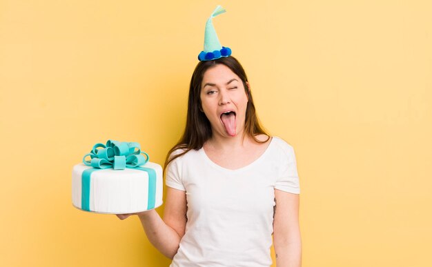 Young woman with a birthday cake