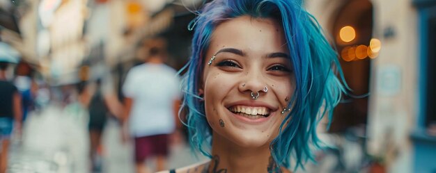 Young woman with blue hair and piercings smiling on a blurry city street background