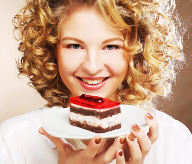 Young woman with a cake