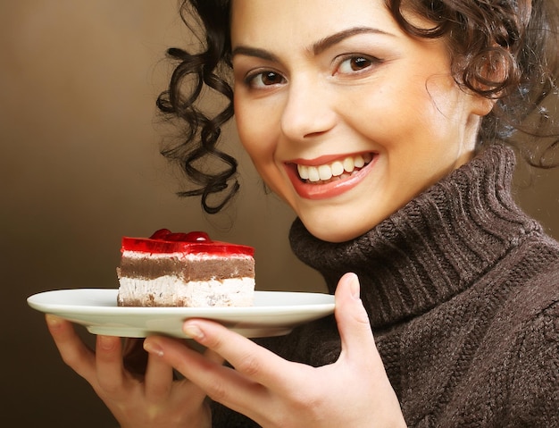 Young woman with a cake