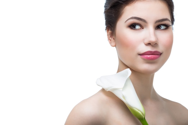 Young woman with calla flower