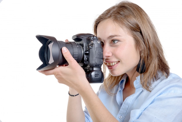 Young woman with a camera