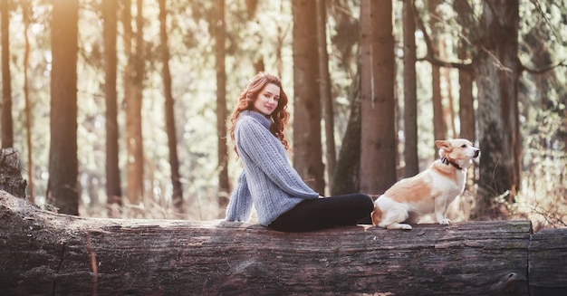 Young woman with dog outdoor