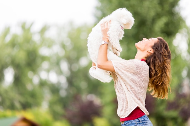 Young woman with a dog