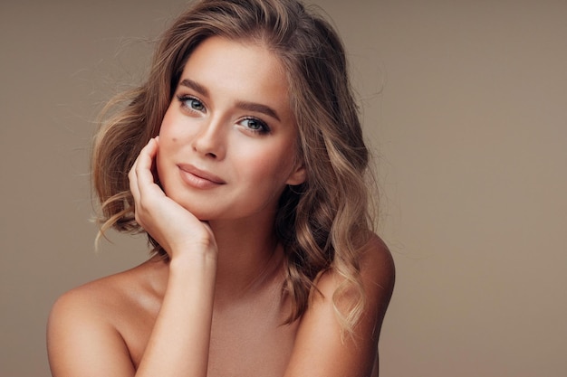 Young woman with evening makeup on grey background Eye shadow product