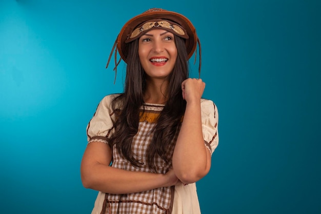 Young woman with festa junina outfit in studio