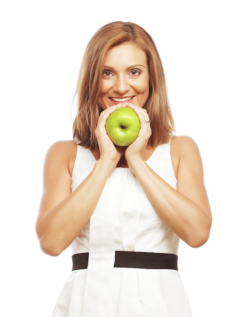 Young woman with green apple