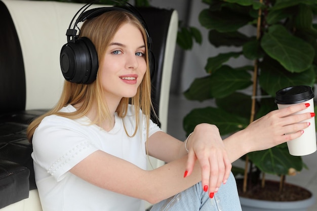 Young woman with headphones listening music