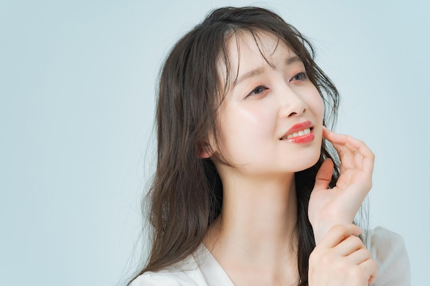 Young woman with long hair with makeup