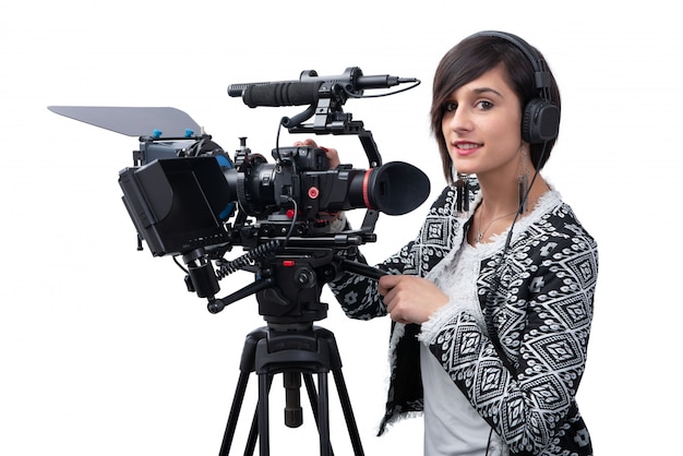 Young woman with professional video camera, dslr, on white