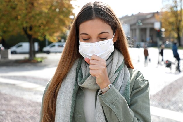 Young woman with protective mask