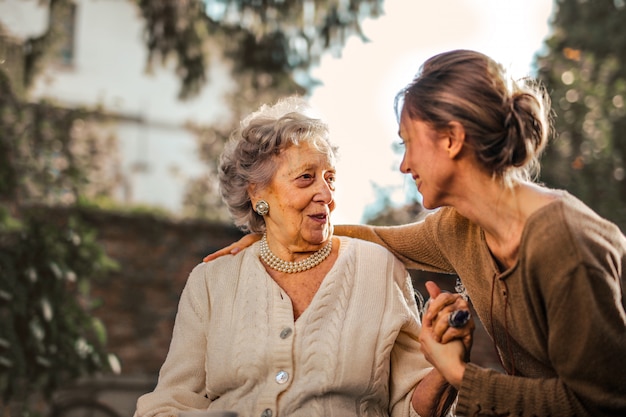 Young woman with a senior lady