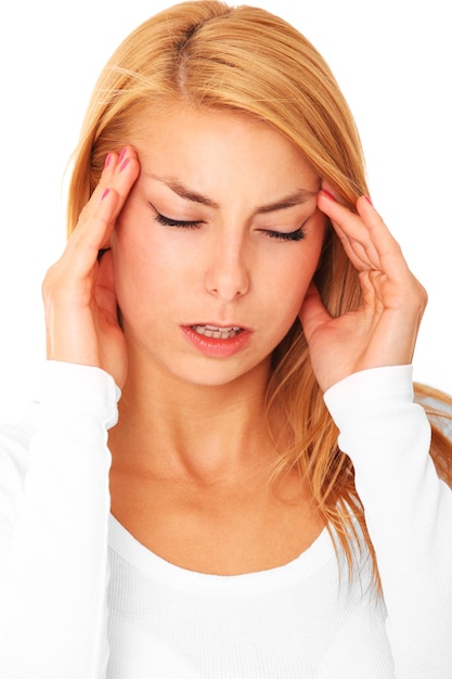 a young woman with severe headache over white