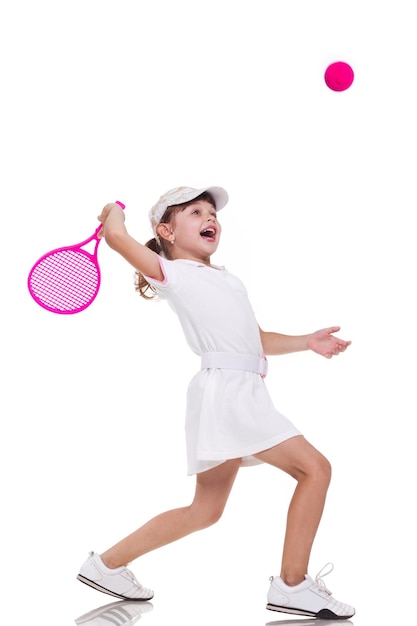 Young woman with tennis racket on white background