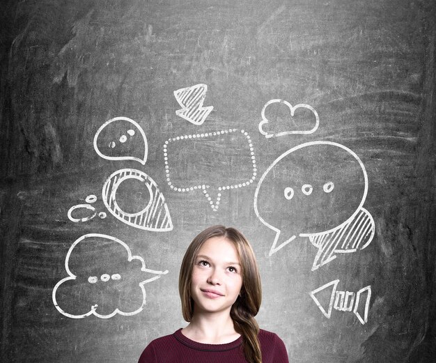 Young woman with thought bubbles