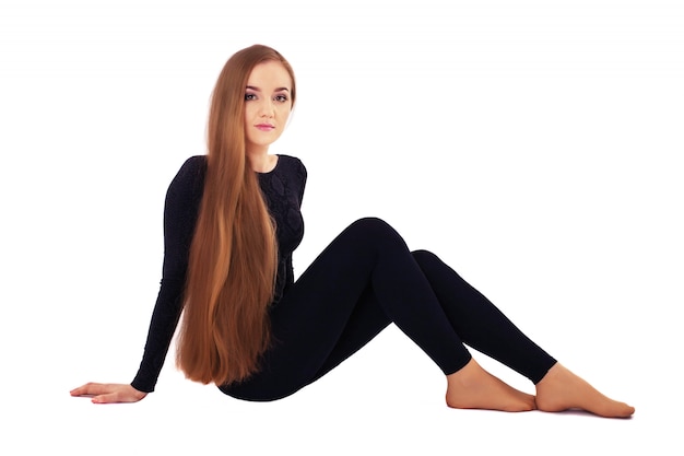 A young woman with very long straight hair. 