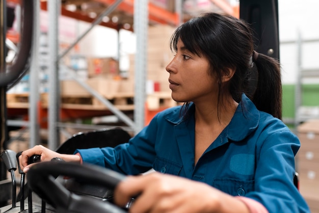 Young woman working in a warehouse