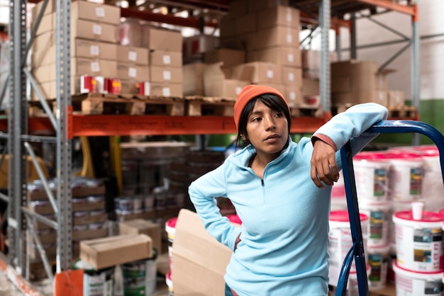 Young woman working in a warehouse